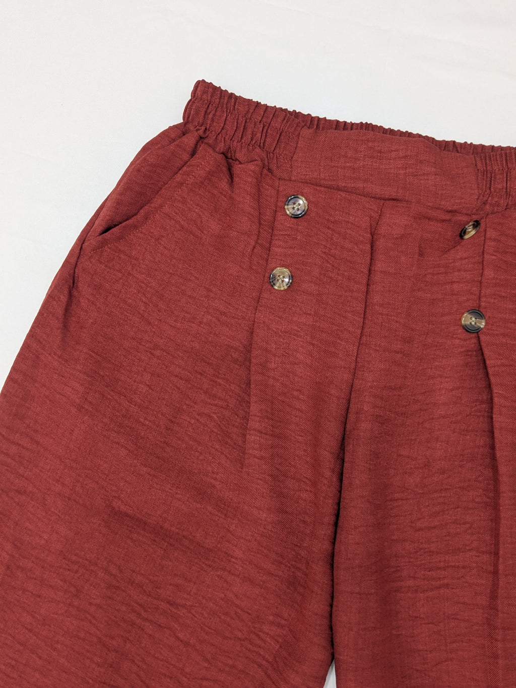 Rust Orange Pleated Button-Accent Trousers